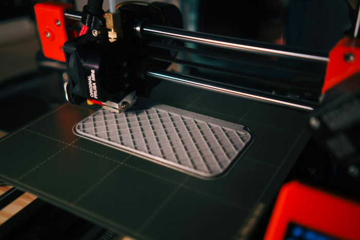 3D printer creating object with grid pattern