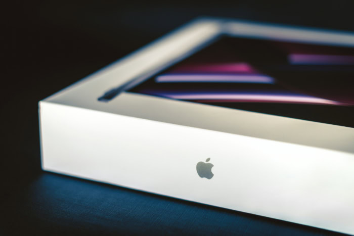 Apple product box with logo on white packaging