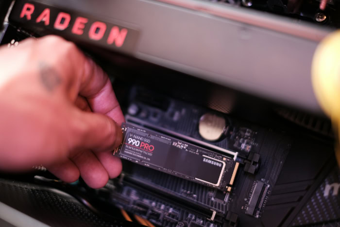 Hand installing Samsung 990 Pro NVMe SSD in PC