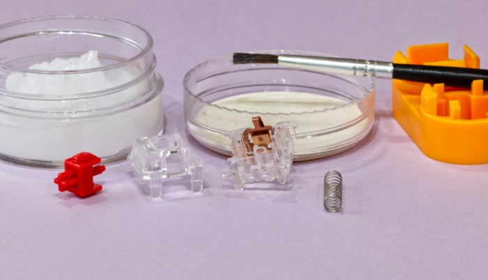 Keyboard switch parts with lubricant and tools