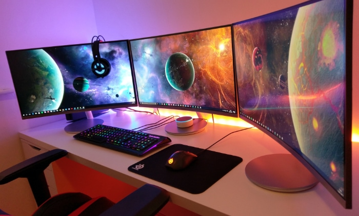 Multiple monitor on white desk