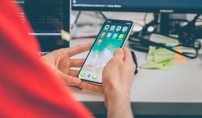 Person holding iPhone