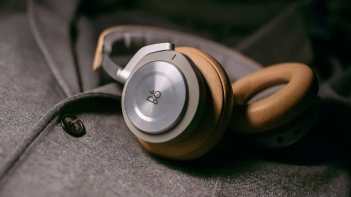 Wireless headphones on gray fabric